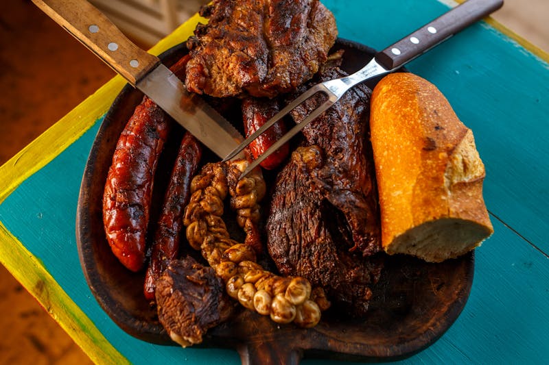 Two-meat 4 rivers BBQ platter with sides